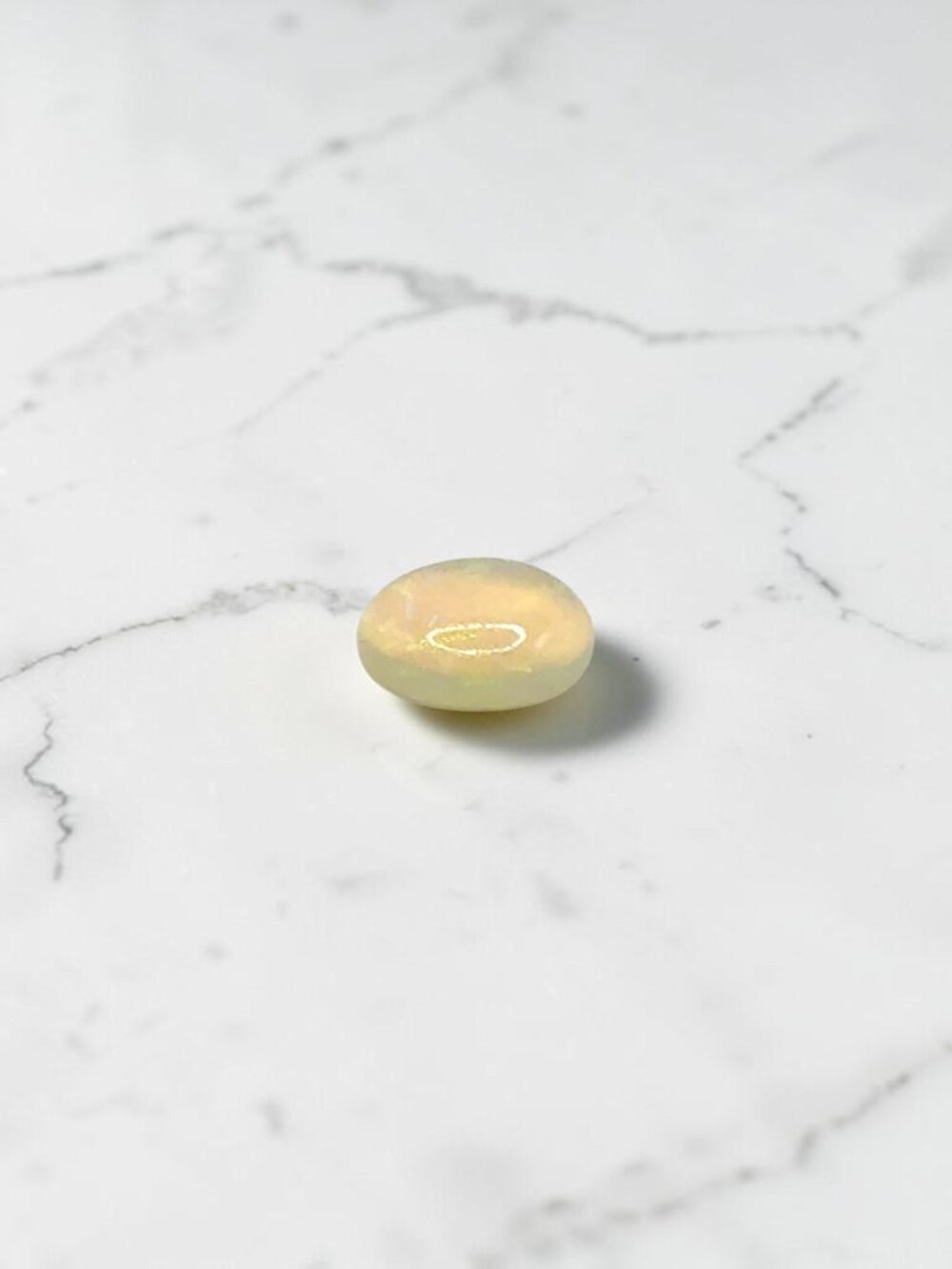 0.62 Carat Oval Cabochon Ethiopian Opal Gemstone